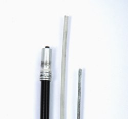 Good quality cables have a teflon liner (in the centre of the photo) that sits between the steel inner wire and the metal part of the outer casing.