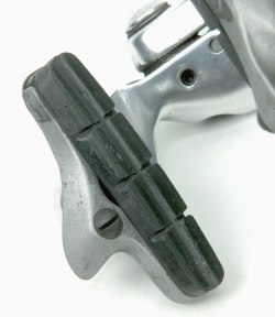 It is time to replace your pads when the friction material is worn to the base of these grooves