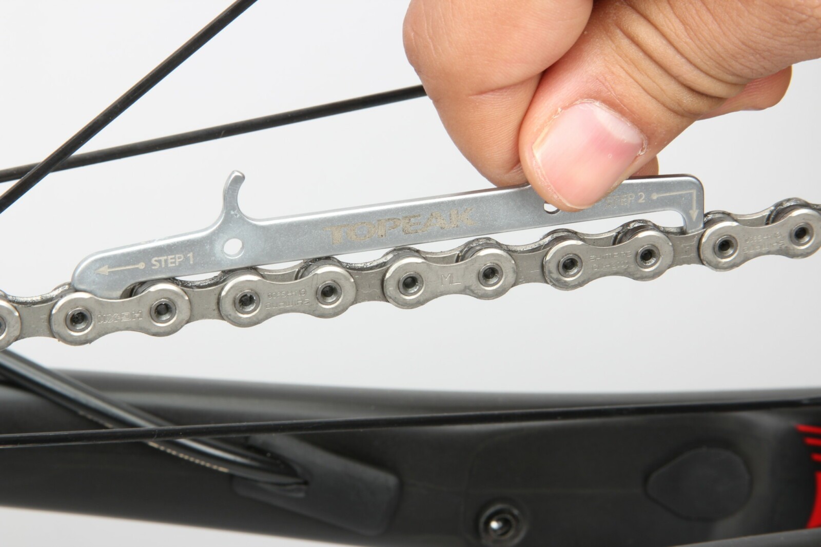 Monitor your drivetrain wear with a chain checker. A worn chain can lead to poor shifting performance and general roughness and inefficiency. If it gets really bad it may fail completely under load, pitching you over the front! Replacing the chain before wear becomes excessive will also extend the life of your cassette and chainrings—items that cost a lot more than the chain.