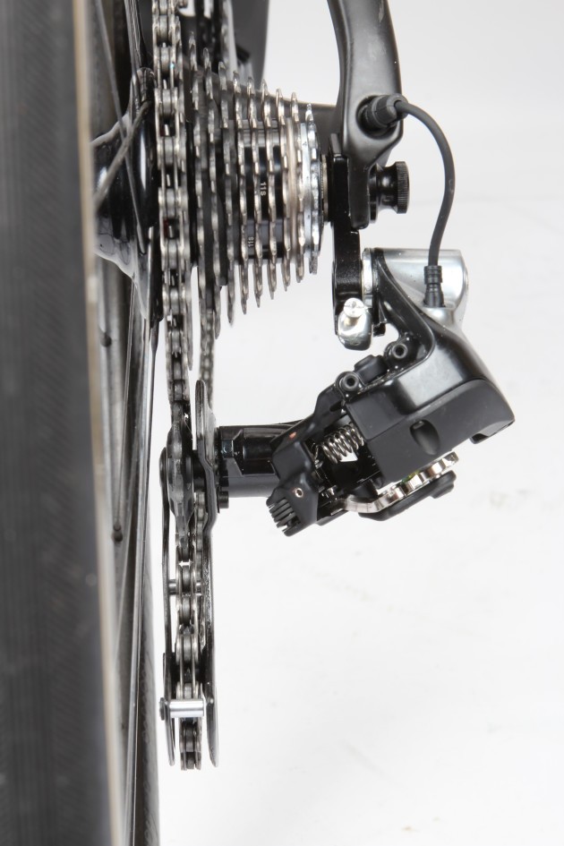 If you ever crash or drop the bike, always inspect the rear derailleur afterwards. The cage should run straight up and down, lining up with the cogs on the cassette. Slowly turn the pedals over and shift into the biggest cog. Check that you can’t ‘overshift’ and put the chain into the spokes. If this happens the gears need adjusting or the derailleur/hanger is bent.