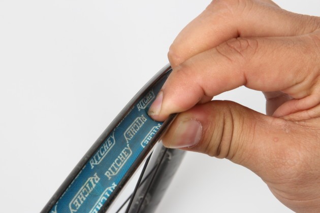 Once a year it’s a good idea to check the condition of your rim tape. Damaged rim tape can expose the tube to sharp edges that can cause repeated ‘mystery punctures’. Pay particular attention to the indentations where the air pressure has forced the tape into the spoke holes and look for longitudinal splits if you have plastic rim strips.