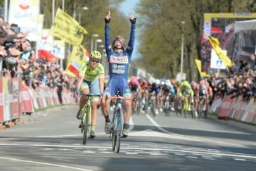 Michal Golas (SKY) rides at the front of the peloton on one of the accents of the Gulperberg in the wet. Photo by Sirotti