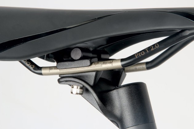 Offset seatpost mount affords a steeper seat tube angle.