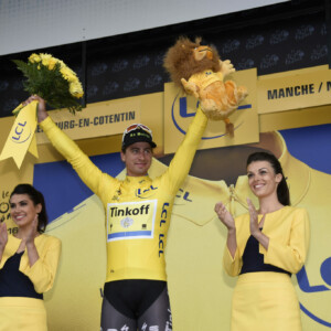 Marcel Kittel in the green Sprint Jersey on Stage 2 of the Tour. Note the graze on his knee from a fall he took on the slick roads earlier that day. Photo by Sirotti