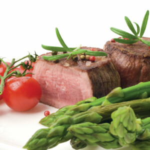 Marcel Kittel in the green Sprint Jersey on Stage 2 of the Tour. Note the graze on his knee from a fall he took on the slick roads earlier that day. Photo by Sirotti