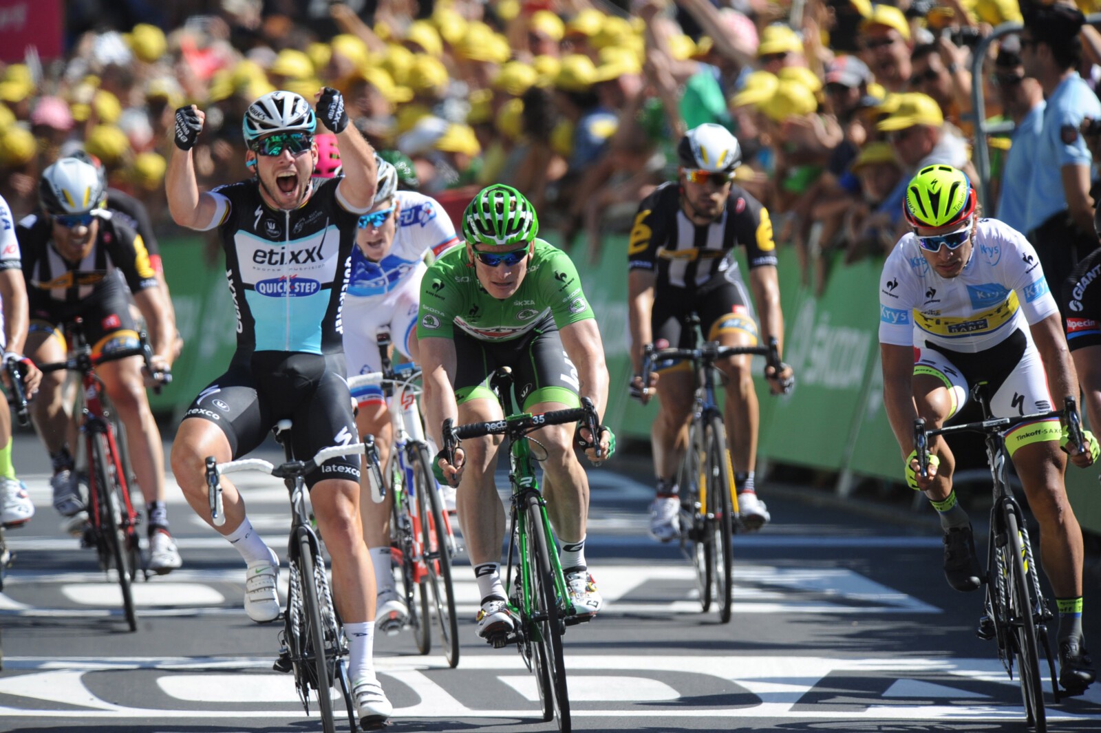 Cavendish winning stage 7 of the Tour de France this year. Also featured in this image is Peter Sagan and Andre Greipel. Photo by Sirotti.