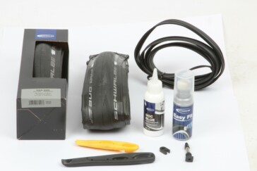 This final step ensures there are no small leaks around the bead-to-rim junction. Hold the rim at a 45-degree angle with the tyre resting on the ground. Once the sealant has settled towards the bottom of the tyre, give it a bounce and a shake to slosh the sealant against the sidewalls. Now move the tyre around an eighth of a turn and repeat. Do this all the way around on both sides and you’ll be ready to hit the road!