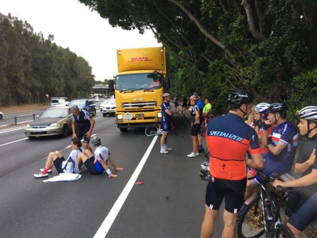 Three cyclists were injured, one seriously, when a delivery truck hit the bunch from behind on Southern Cross Drive near Sydney.