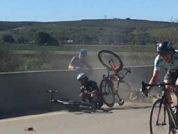 Mike Allec was left clinging to the wrong side of a bridge after a crash during the closing metres of a race in Nevada.Image: Carefast/Storck Cycling Team.