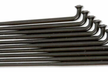 You can see the single eyelets in this rim, fixed to only the inner wall. These reinforce the spoke hole to prevent cracking around the nipple, help to prevent the nipple pulling through and also allow the nipple to turn more easily while building.