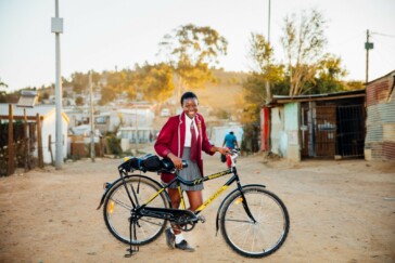Mark Cavendish of Team Dimension Data proudly flies the Qhubeka flag at the Tour de France.