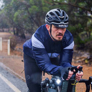 IPWR leader Kristof Allegaert alongside the race route near Moss Vale after hearing of the tragic death of a fellow competitor. Image: Nat Bromhead