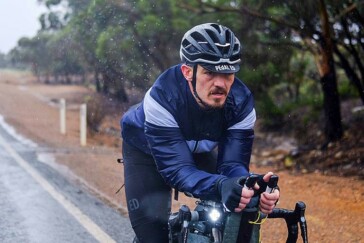 IPWR leader Kristof Allegaert alongside the race route near Moss Vale after hearing of the tragic death of a fellow competitor. Image: Nat Bromhead