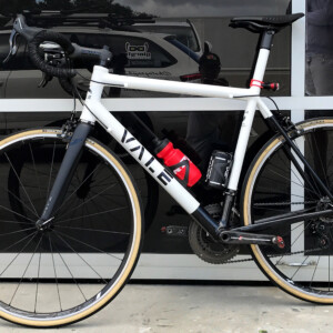 Proud of his creation, Tristan Tucker shows off his first custom Vale hand made bike. Image: Nat Bromhead