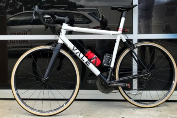 Proud of his creation, Tristan Tucker shows off his first custom Vale hand made bike. Image: Nat Bromhead