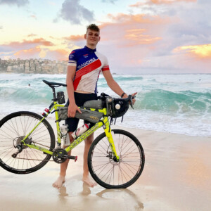 Lochie Kavanagh with his proud dad Andrew on the steps of the Sydney Opera House after his arrival. Image: Nat Bromhead