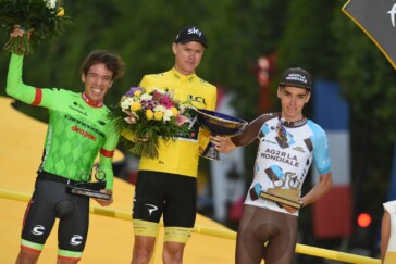 Simon Clarke with a young fan after the finish of the 2017 Tour de France in Paris. Image: Nat Bromhead.