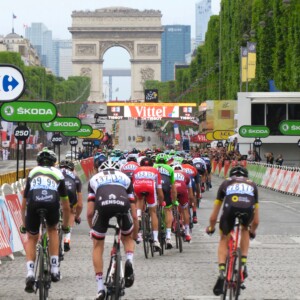 Simon Clarke with a young fan after the finish of the 2017 Tour de France in Paris. Image: Nat Bromhead.