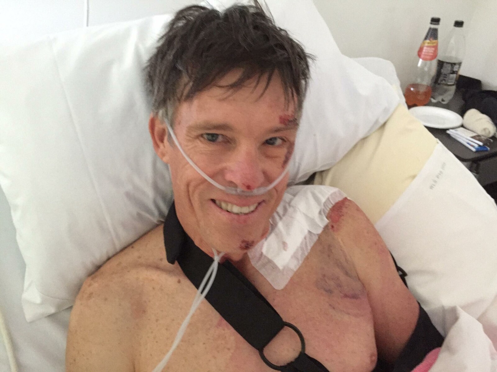 All smiles, Phil Anderson retains his trademark positive persona from his hospital bed. Image: Facebook
