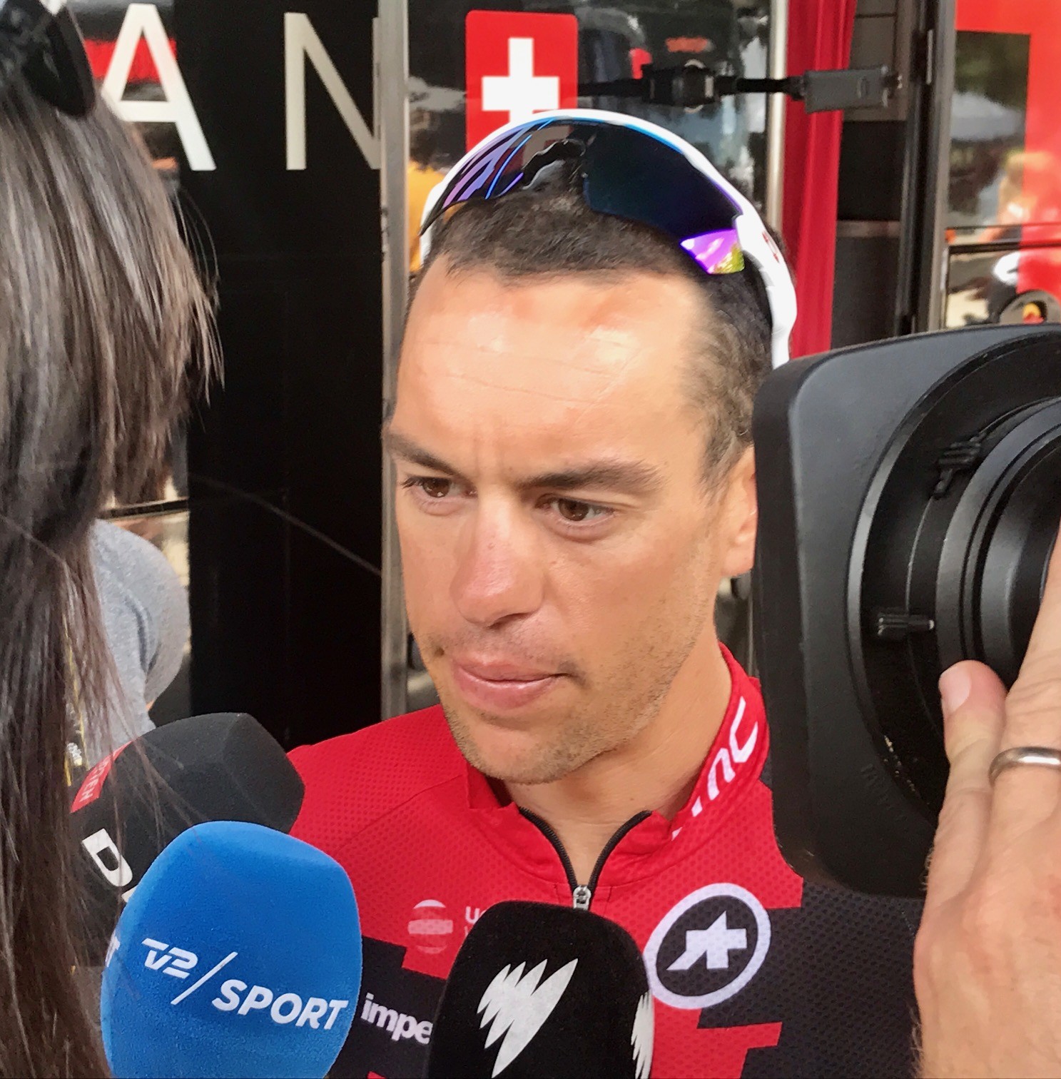 Richie Porte of BMC Racing Team speaks with reporters at the start of Stage 8 in Dole. Today's Stage 9 will be critical for Ritchie & the team's Tour. Image: Nat Bromhead.