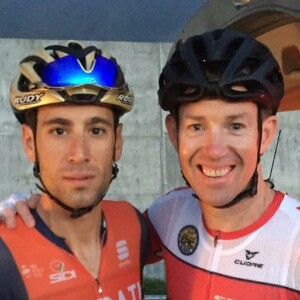 Megan Scott (white jersey) celebrates her Bowral Classic success with members of the Giant Sydney Cycling Club at the event village.
