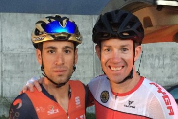 Megan Scott (white jersey) celebrates her Bowral Classic success with members of the Giant Sydney Cycling Club at the event village.
