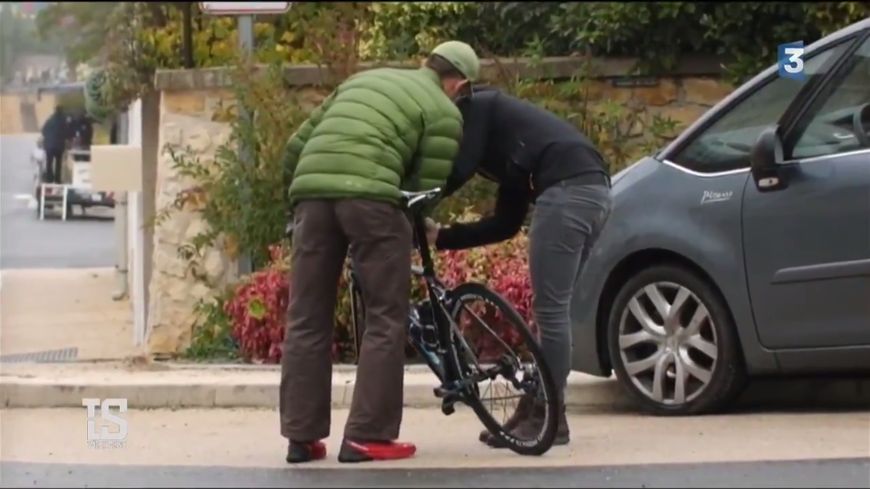 Simon Clarke with a young fan after the finish of the 2017 Tour de France in Paris. Image: Nat Bromhead.