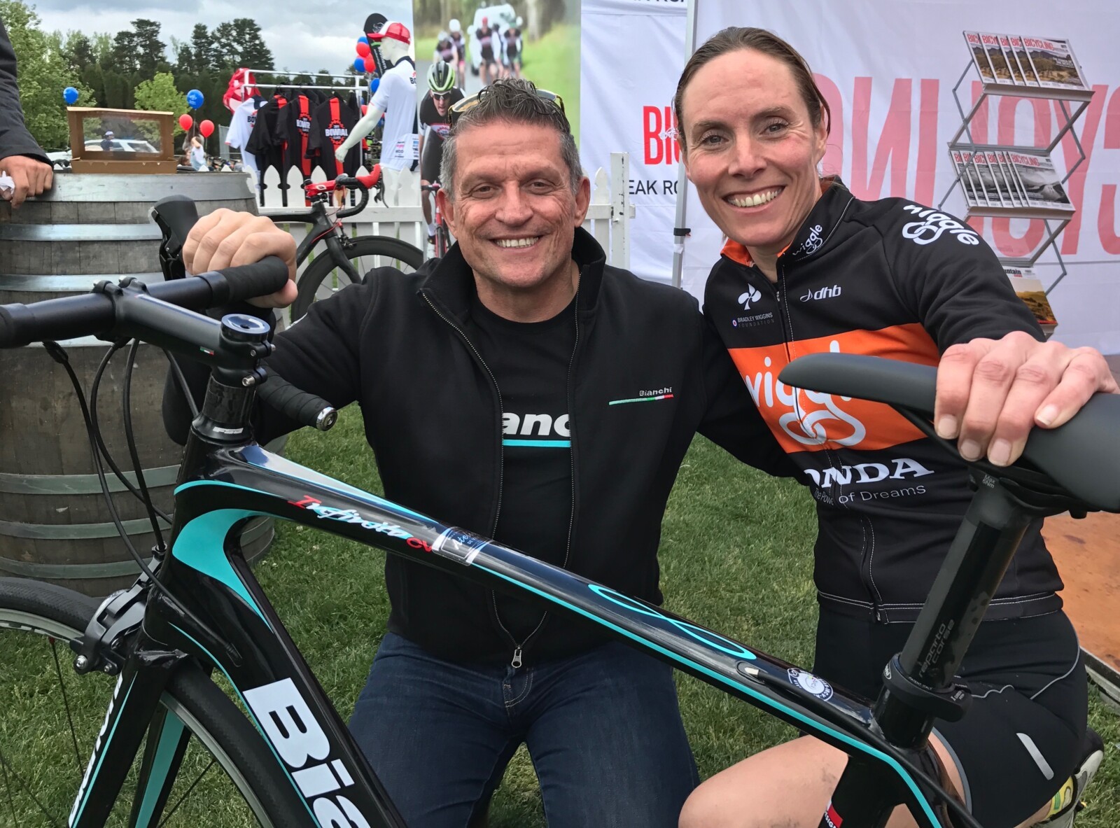 Megan Scott (white jersey) celebrates her Bowral Classic success with members of the Giant Sydney Cycling Club at the event village.