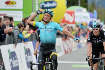Ever a crowd favourite, Scarponi speaks with a fan while wearing the leader's jersey at the Tour of the Alps. Image: Sirotti
