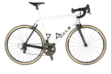 Simon Clarke with a young fan after the finish of the 2017 Tour de France in Paris. Image: Nat Bromhead.