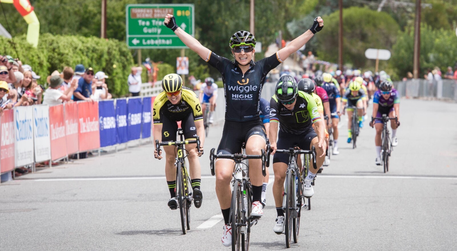 Nettie Edmondson celebrates her win at the 2018 Santos Women's Tour Down Under. Image: Kirsty Baxter