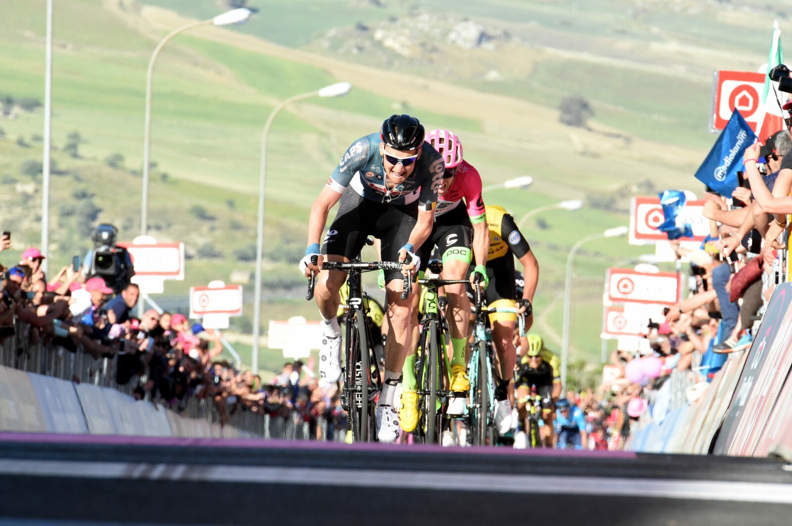 Stage 3 winner Tim Wellens edges out Michael Woods on the final climb to the Stage 3 finish in Sicily. Image: Sirotti.