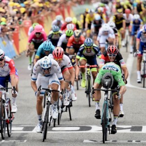 Crowd favourite Dan Martin of UAE Emirates makes his way up Alp d'Huez. Image: Sirotti.