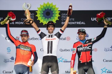 Megan Scott (white jersey) celebrates her Bowral Classic success with members of the Giant Sydney Cycling Club at the event village.