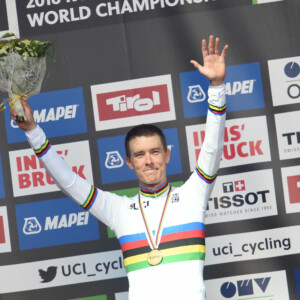 Rohan Dennis on the podium with second placed Tom Dumoulin and third Victor Campenaerts. Image: Sirotti