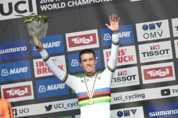 Rohan Dennis on the podium with second placed Tom Dumoulin and third Victor Campenaerts. Image: Sirotti