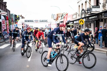 The atmosphere of the 'event avenue' was electric as thousands of participants gathered to celebrate their ride, look over the latest cycling gear and eat, drink and recover. Image: Nat Bromhead