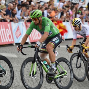 Riders of the 2018 Tour de France make their way along the Champs de Elysees during the finishing circuits of the 2018 Tour. Image: Sirotti