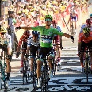 Riders of the 2018 Tour de France make their way along the Champs de Elysees during the finishing circuits of the 2018 Tour. Image: Sirotti