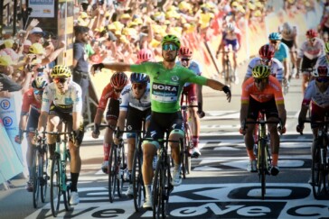 Riders of the 2018 Tour de France make their way along the Champs de Elysees during the finishing circuits of the 2018 Tour. Image: Sirotti