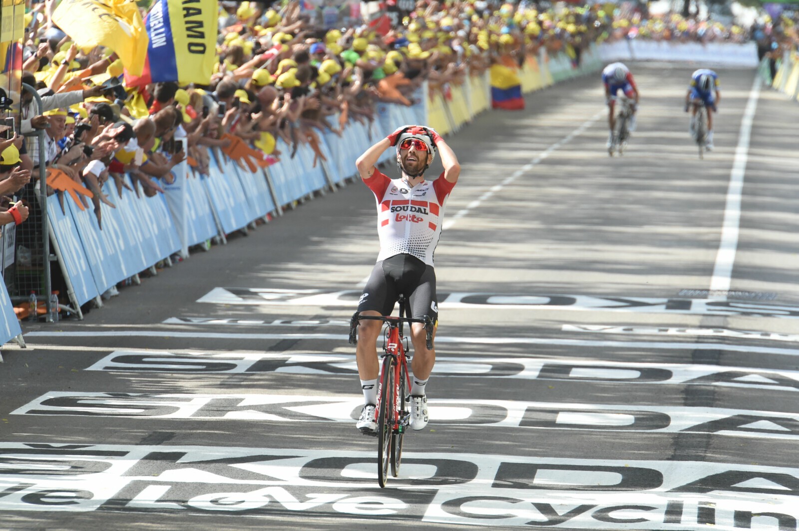 Riders of the 2018 Tour de France make their way along the Champs de Elysees during the finishing circuits of the 2018 Tour. Image: Sirotti