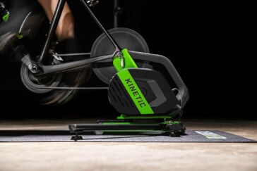 Megan Scott (white jersey) celebrates her Bowral Classic success with members of the Giant Sydney Cycling Club at the event village.