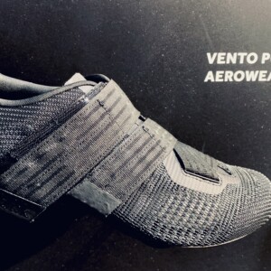 Megan Scott (white jersey) celebrates her Bowral Classic success with members of the Giant Sydney Cycling Club at the event village.