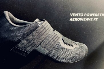 Megan Scott (white jersey) celebrates her Bowral Classic success with members of the Giant Sydney Cycling Club at the event village.