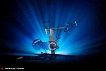 Megan Scott (white jersey) celebrates her Bowral Classic success with members of the Giant Sydney Cycling Club at the event village.