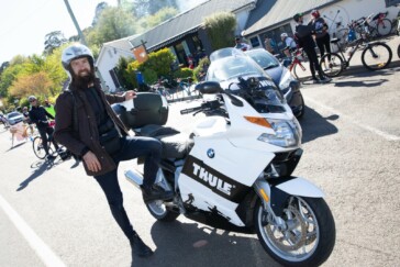Beardy Mc Beard aboard the Thule moto with pilot Jacob. Image Tim Levy.